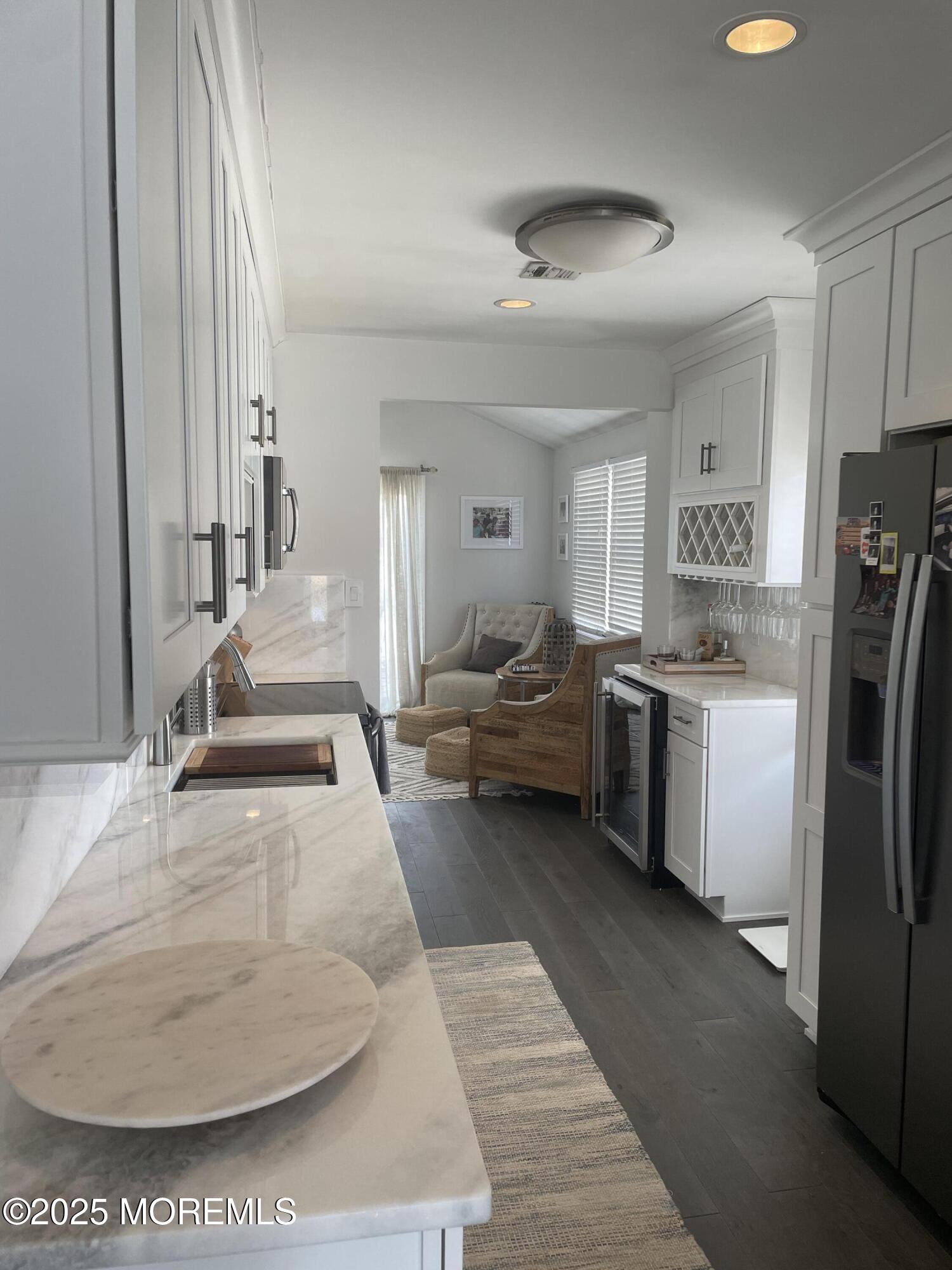 30 N Street Seaside Park, NJ 08752 - Photo 30 of 38 a living room with furniture and a fireplace