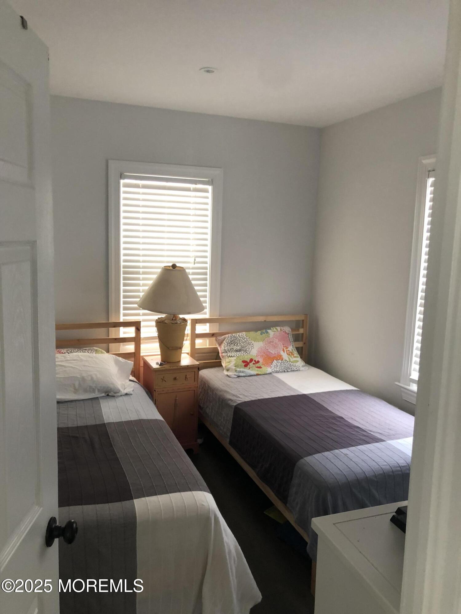 30 N Street Seaside Park, NJ 08752 - Photo 34 of 38 a bedroom with two beds and a window