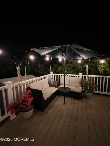 a view of balcony with furniture