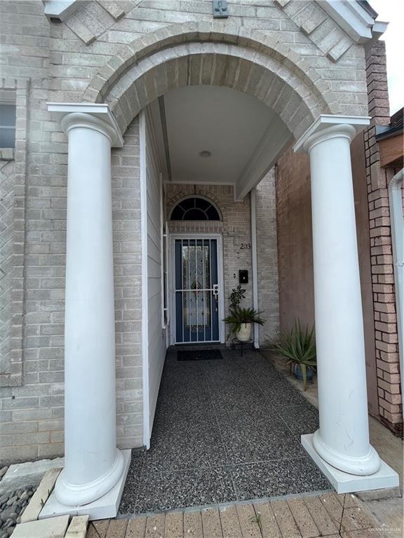 2113 South 3rd Street McAllen, TX 78503 - Photo 3 of 26 a front view of a house with a porch