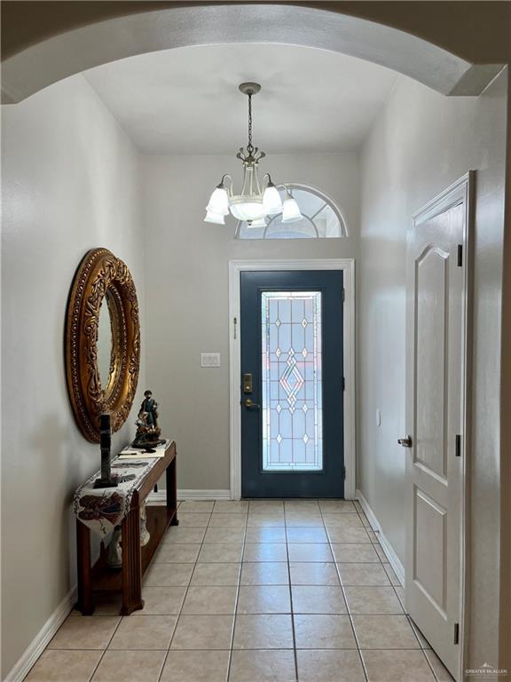2113 South 3rd Street McAllen, TX 78503 - Photo 5 of 26 a view of a hallway with entryway wooden floor and front door