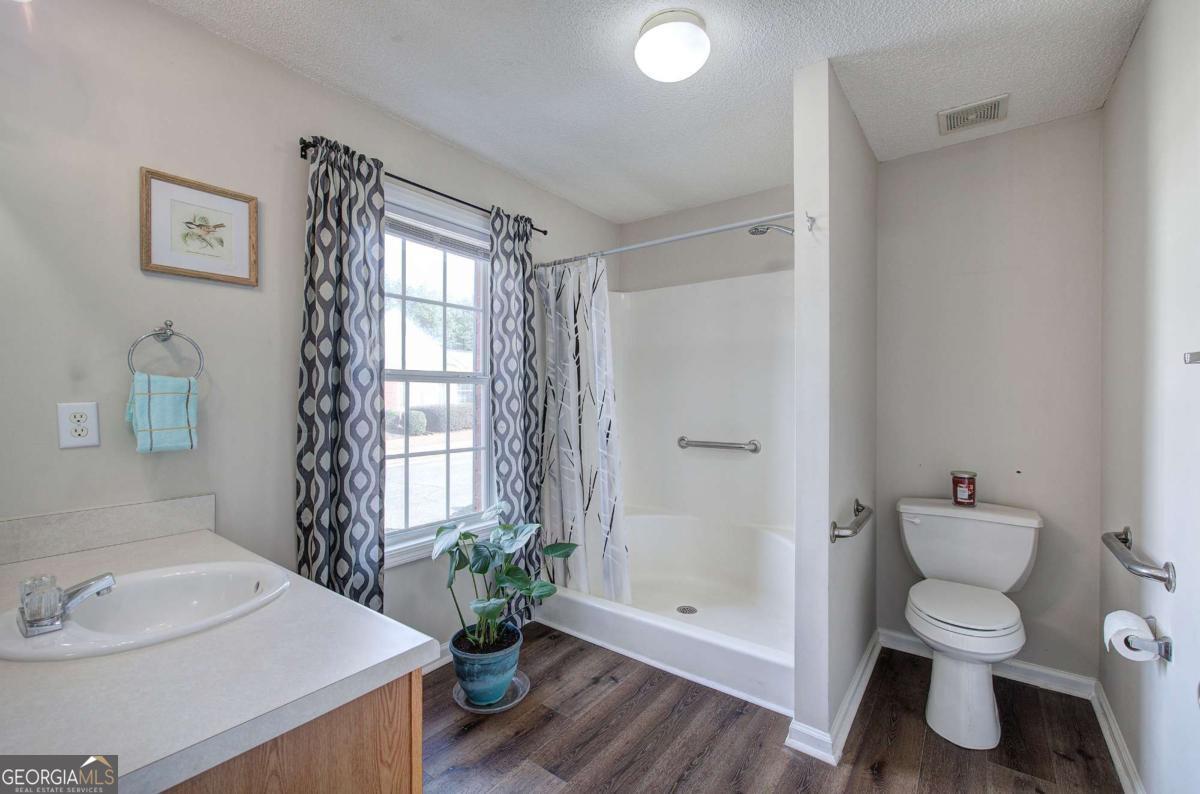 150 Old Mill Road, Unit 123 Cartersville, GA 30120 - Photo 15 of 27 a bathroom with a sink toilet and shower