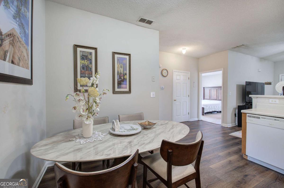 150 Old Mill Road, Unit 123 Cartersville, GA 30120 - Photo 10 of 27 a view of a dining room with furniture