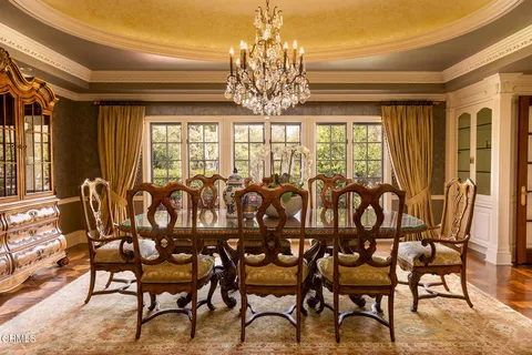 a room with gym equipment and large mirror