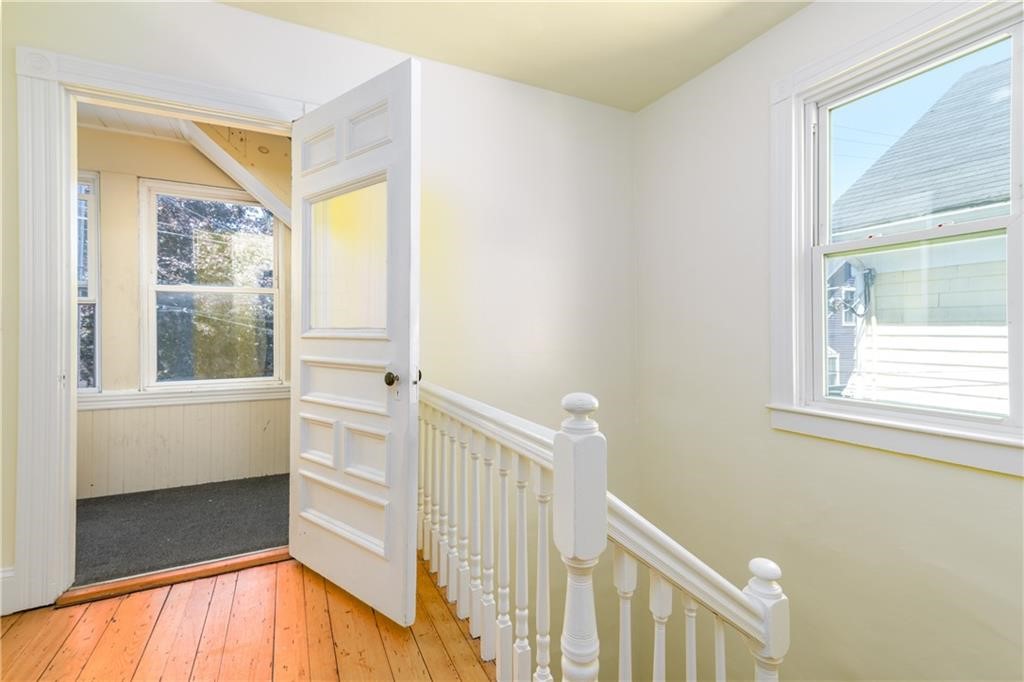 9 Ann Street Newport, RI 02840 - Photo 10 of 26 Top of stairs Entry to Unit 2. Enclosed Porch
