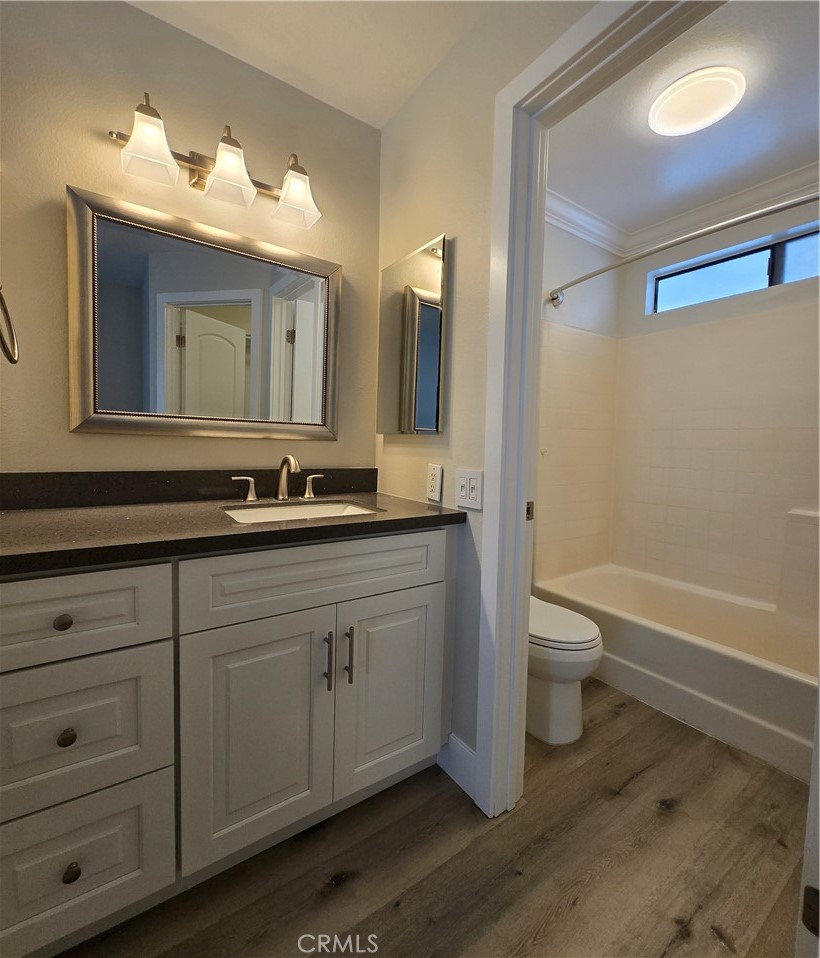 377 Huntington Irvine, CA 92620 - Photo 5 of 8 a bathroom with a sink and a mirror