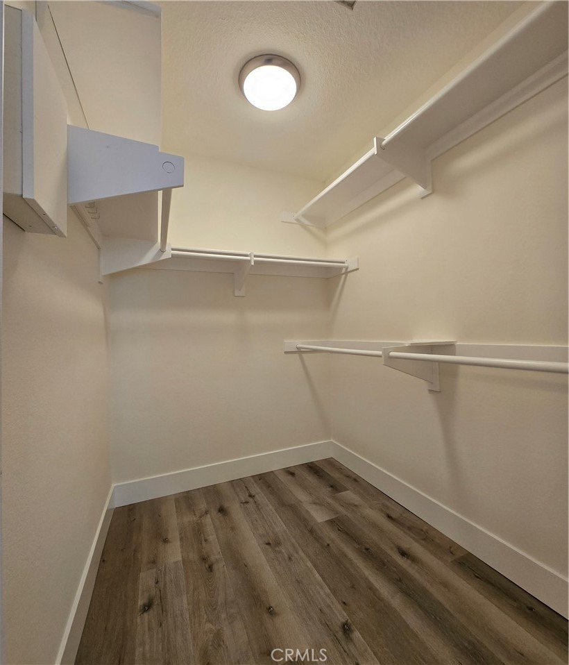 377 Huntington Irvine, CA 92620 - Photo 7 of 8 a view of a room with wooden floor