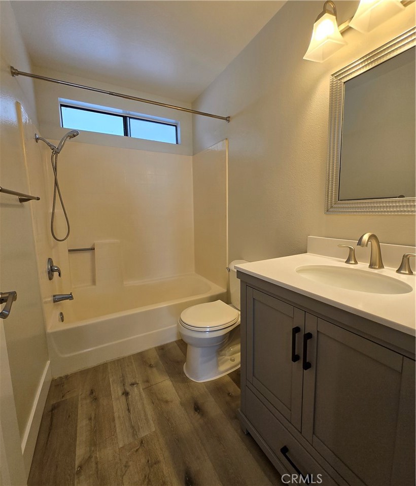 377 Huntington Irvine, CA 92620 - Photo 8 of 8 a bathroom with a sink a toilet and shower