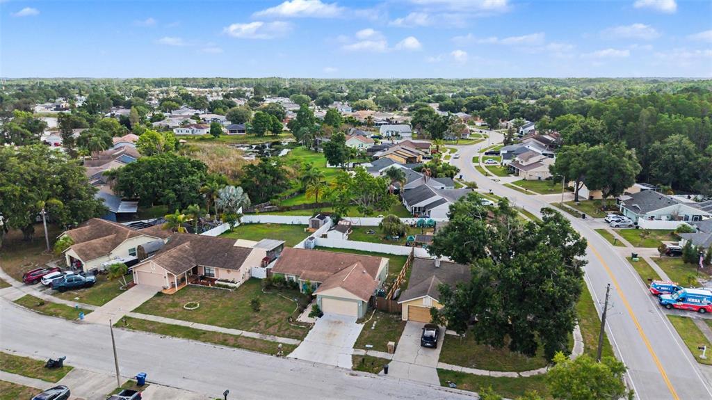 1632 Pintail Court Lutz, FL 33549 - Photo 31 of 34 an aerial view of residential houses with outdoor space
