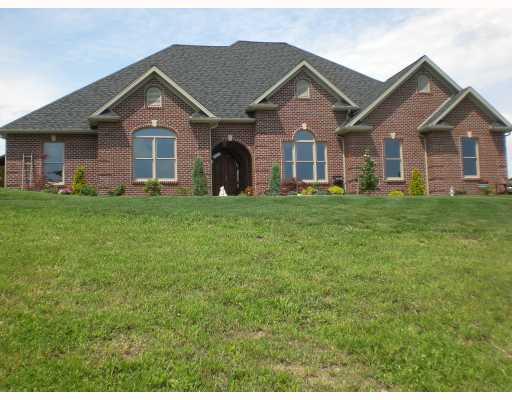 Exterior Front. Delightful all brick ranch, nestled on top of Glengarry Golf Course. Fits the adage: location, location, location. A view from every window!