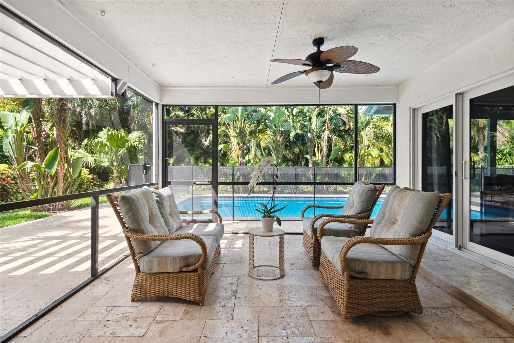 1055 Parkside Circle North Boca Raton, FL 33486 - Photo 19 of 24 a living room with furniture and a large window