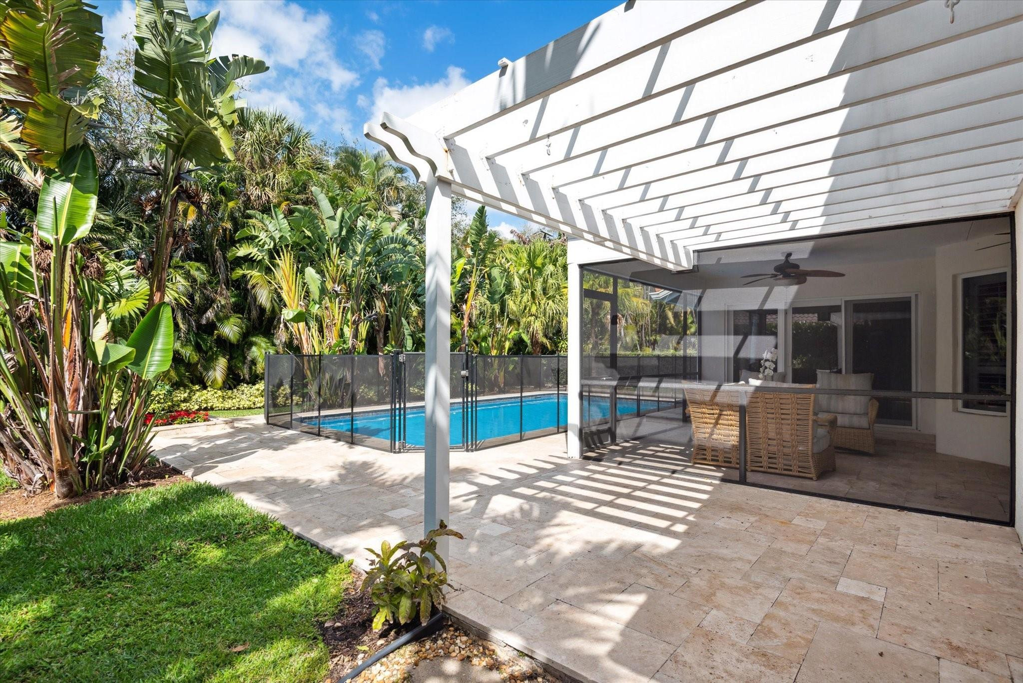 1055 Parkside Circle North Boca Raton, FL 33486 - Photo 20 of 24 a view of a house with backyard and sitting area