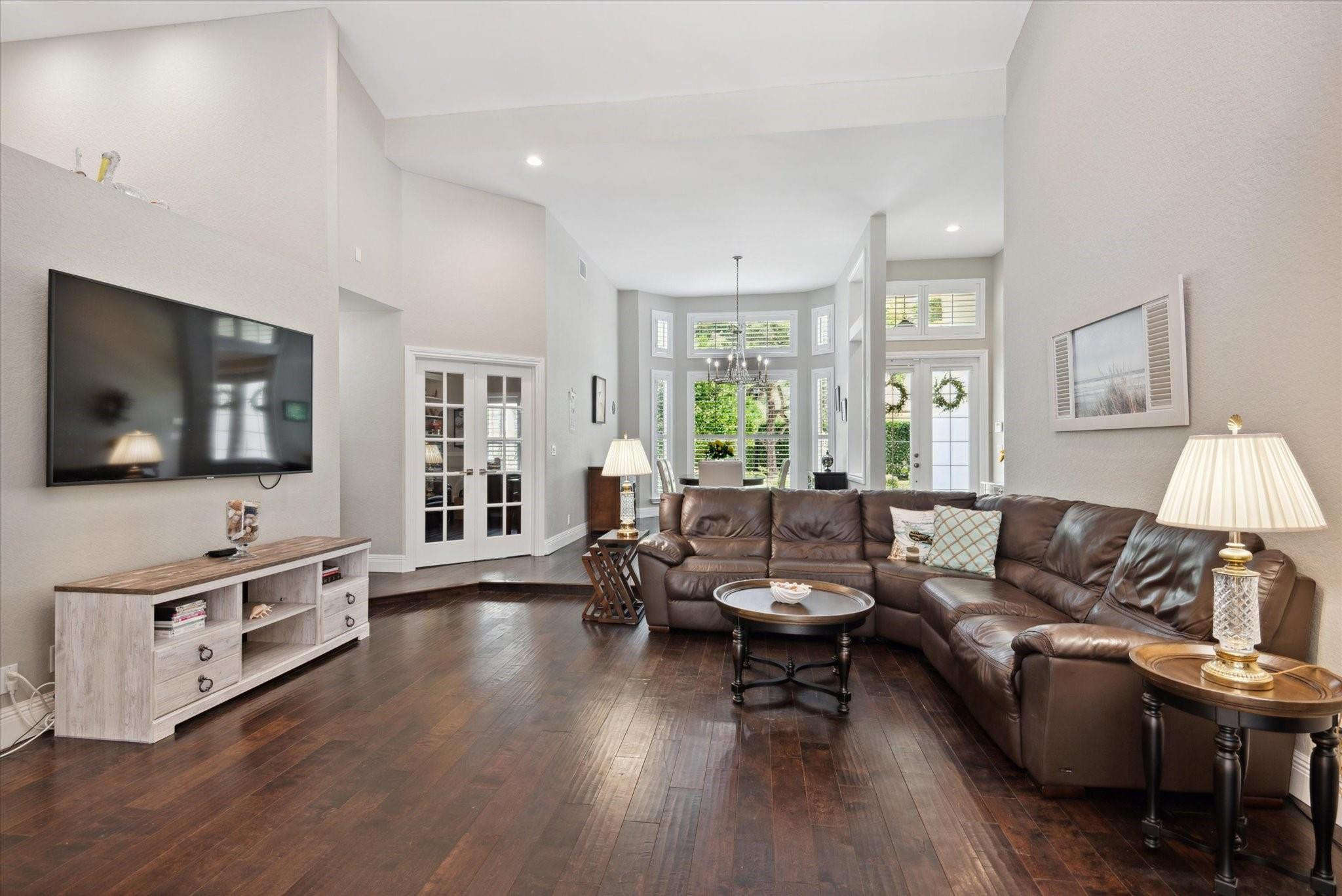 1055 Parkside Circle North Boca Raton, FL 33486 - Photo 4 of 24 a living room with furniture flat screen tv and wooden floor