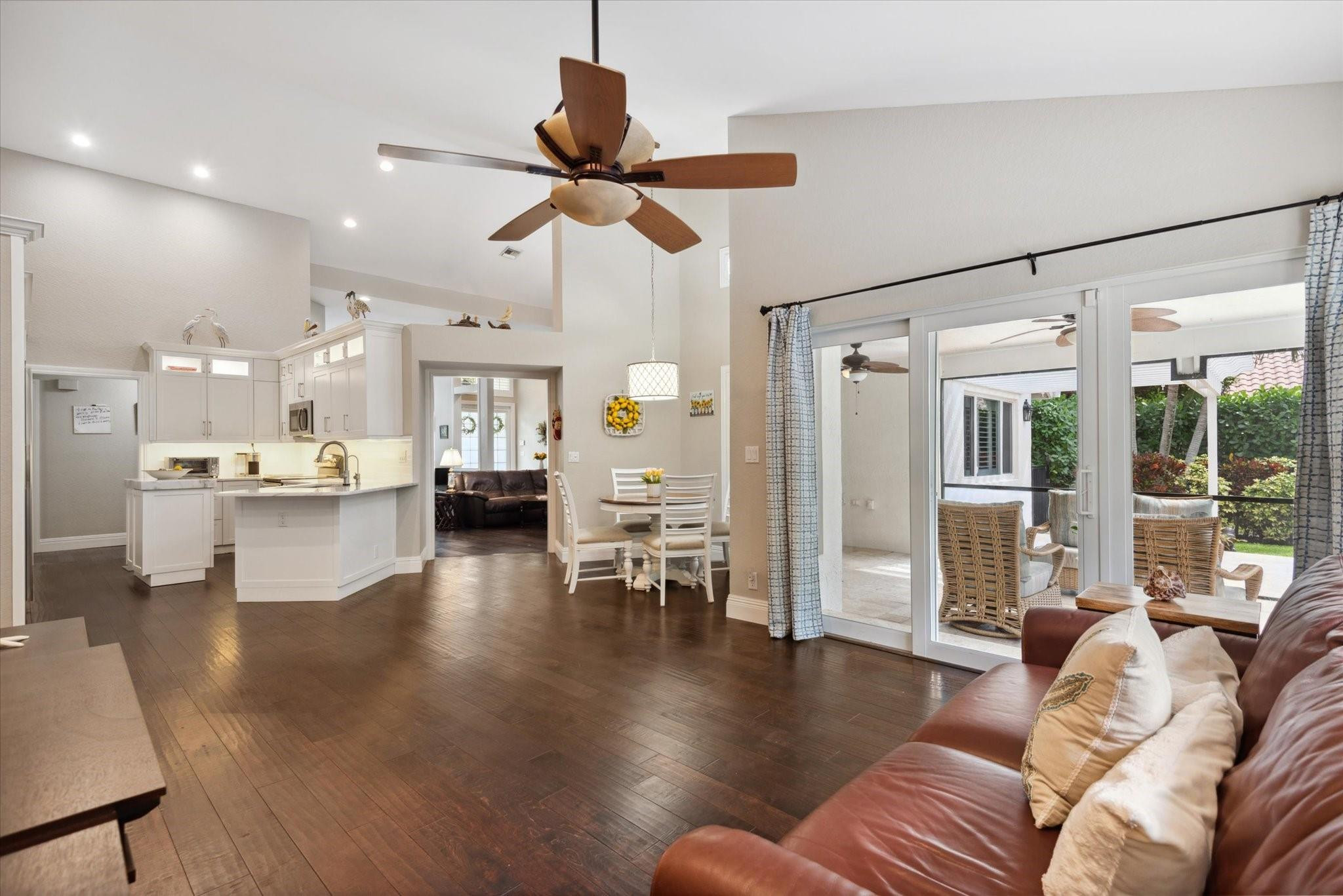 1055 Parkside Circle North Boca Raton, FL 33486 - Photo 8 of 24 a living room with fireplace furniture and a wooden floor