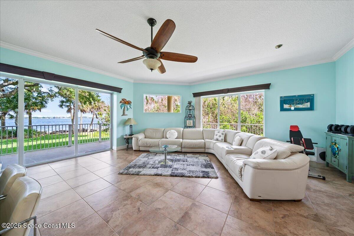 6005 Highway 1, Unit 101 Rockledge, FL 32955 - Photo 17 of 57 a living room with furniture and a large window