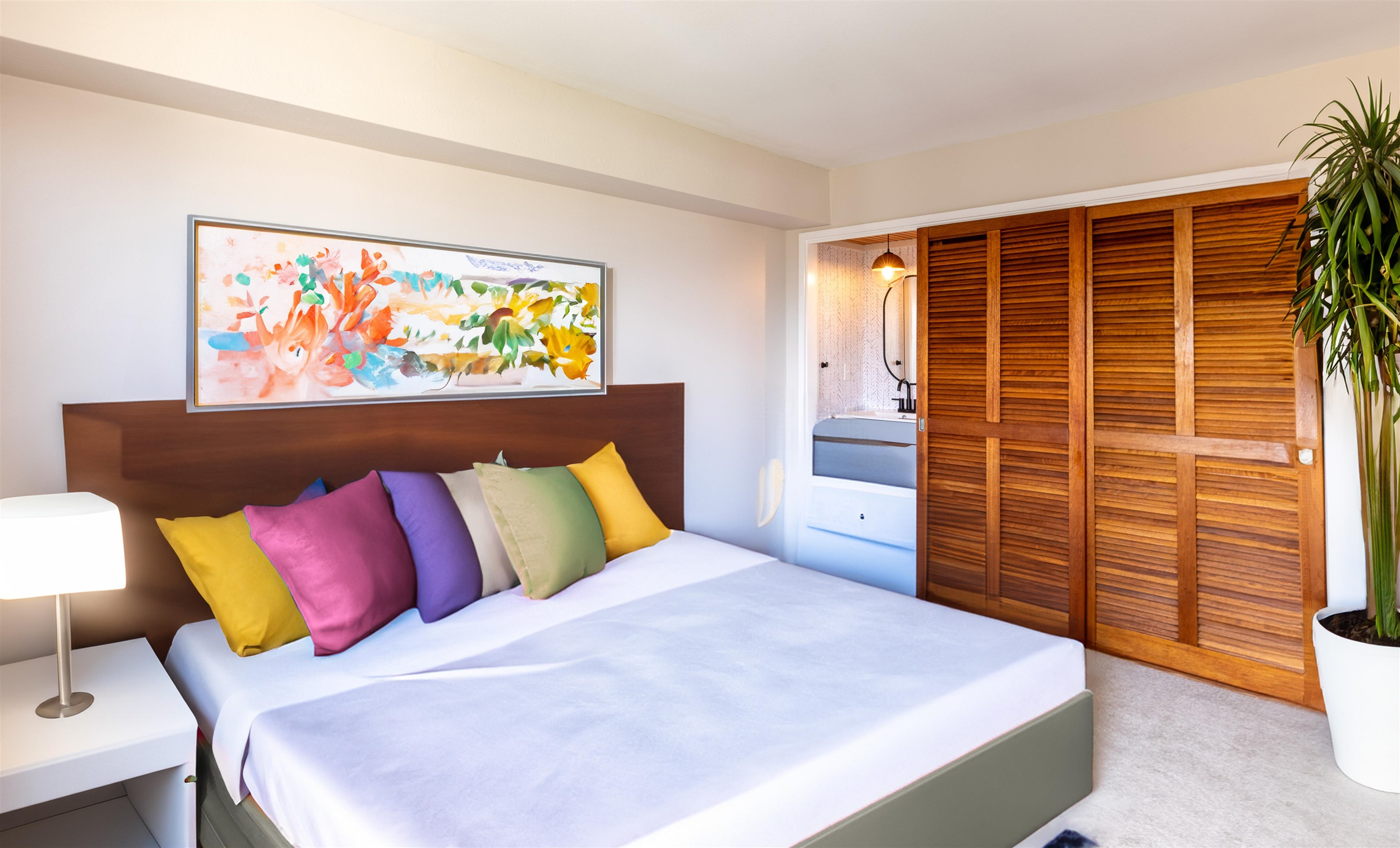 2158 Main Street, Unit 707 Wailuku, HI 96793 - Photo 19 of 27 a bedroom with a bed and a window