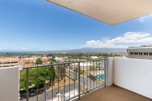 a view of a balcony with an ocean view