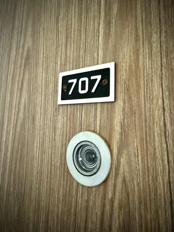 a sign that is on a wooden wall