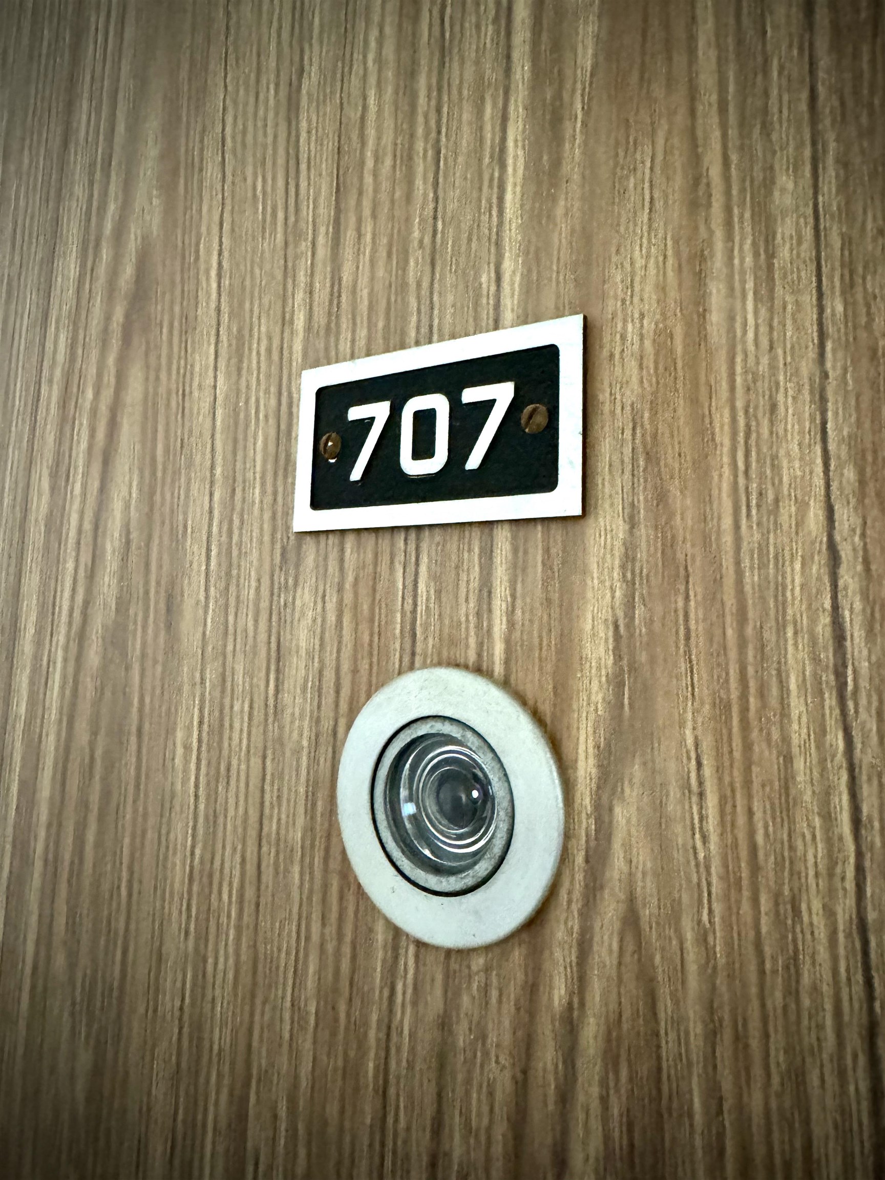 2158 Main Street, Unit 707 Wailuku, HI 96793 - Photo 5 of 27 a sign that is on a wooden wall