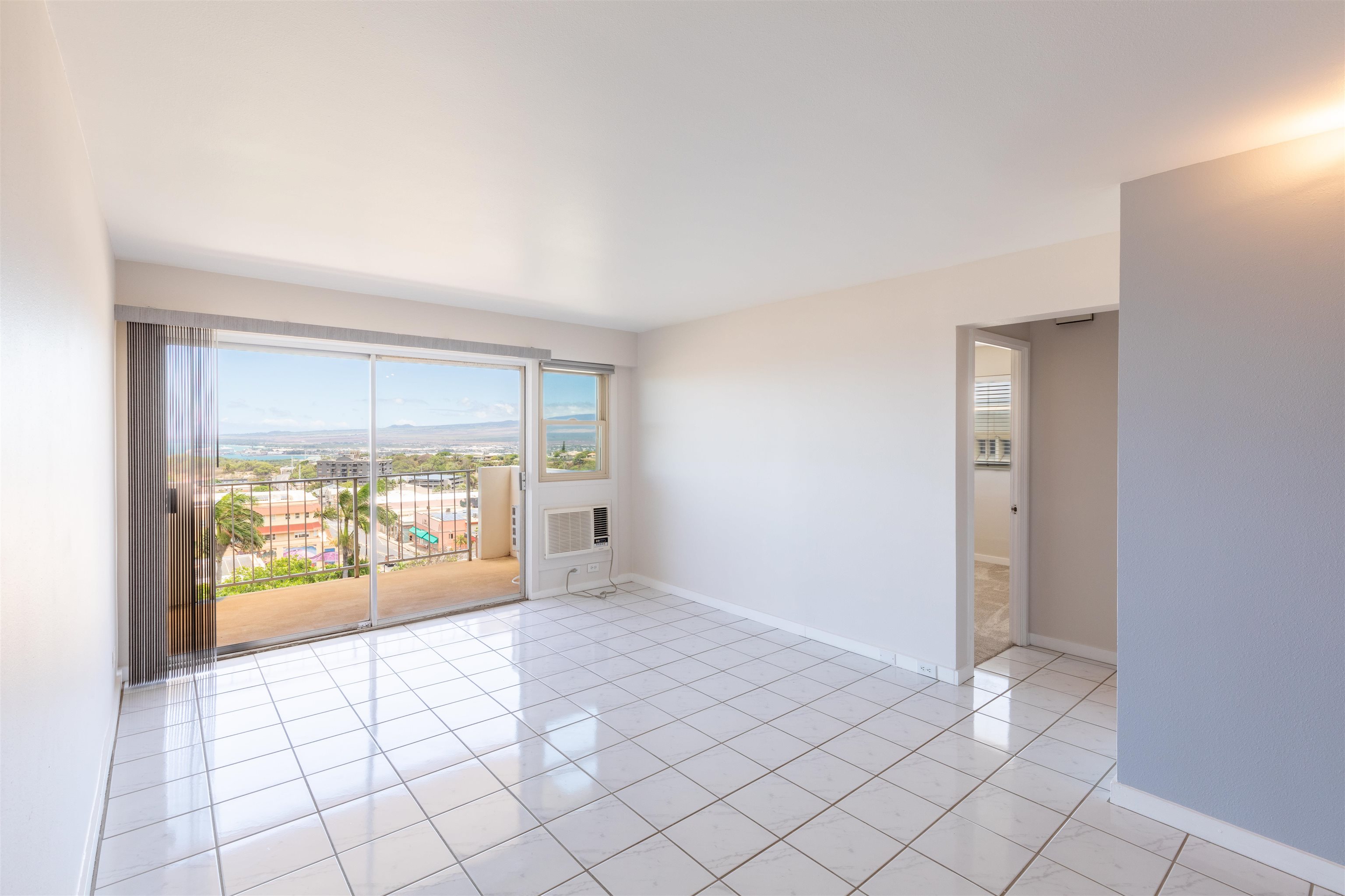 2158 Main Street, Unit 707 Wailuku, HI 96793 - Photo 6 of 27 a view of an empty room and window