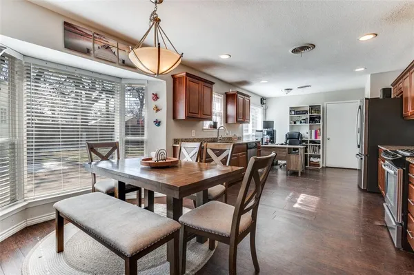 a view of a dining room with furniture