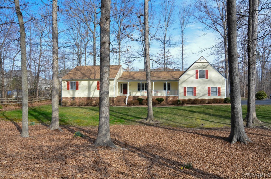 13200 Queensgate Road Midlothian, VA 23114 - Photo 1 of 24 a front view of a house with a yard