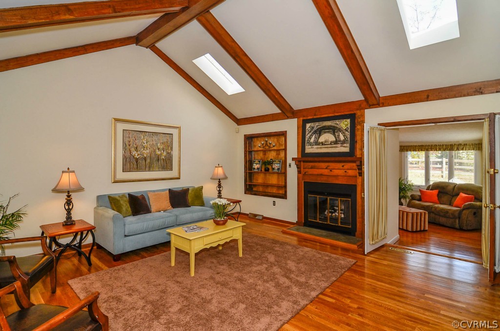 13200 Queensgate Road Midlothian, VA 23114 - Photo 11 of 24 a living room with furniture and a fireplace