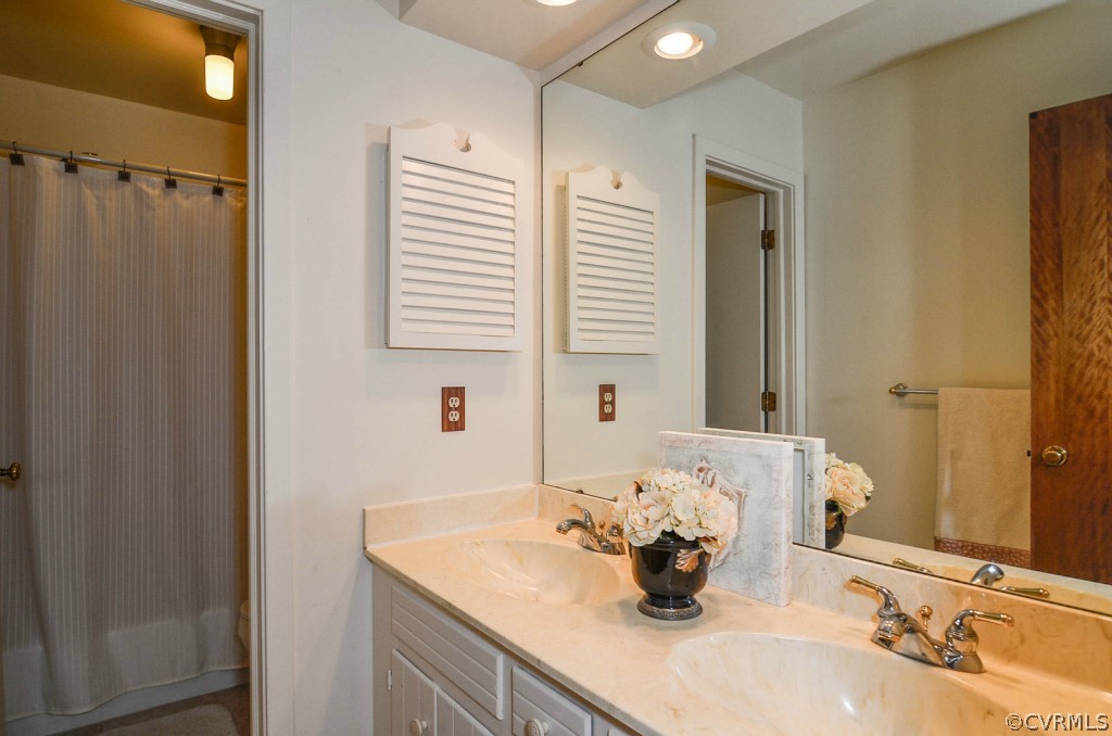 13200 Queensgate Road Midlothian, VA 23114 - Photo 17 of 24 a bathroom with a granite countertop sink and a mirror