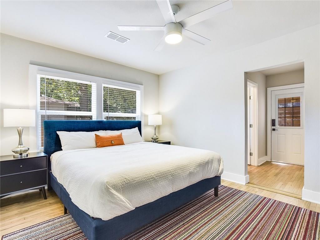 3304 Robinson Avenue, Unit 1 Austin, TX 78722 - Photo 10 of 13 Second primary bedroom with king bed and private bath.