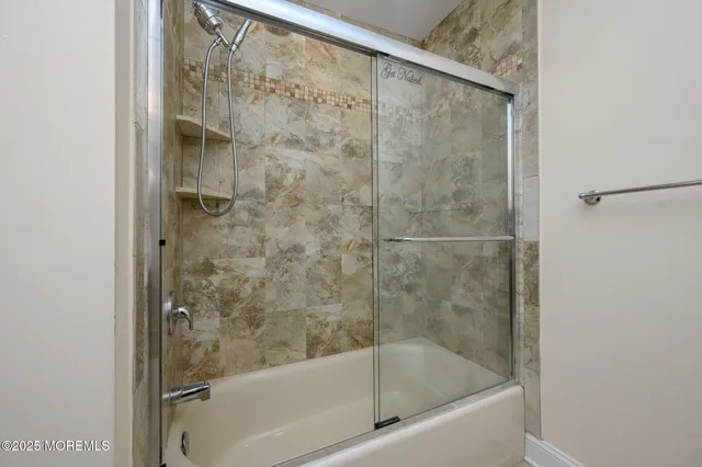 a bathroom with a bathtub