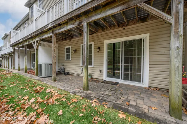 a front view of a house with a large window