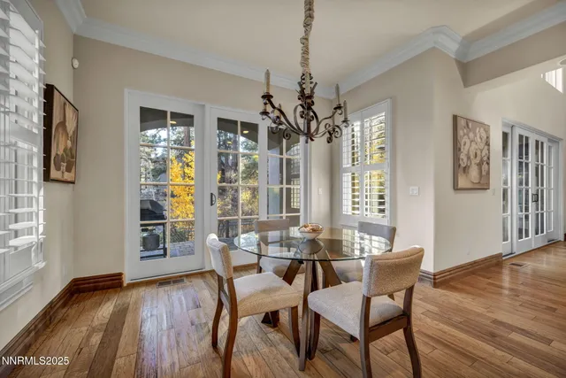a living room with furniture fireplace and flat screen tv
