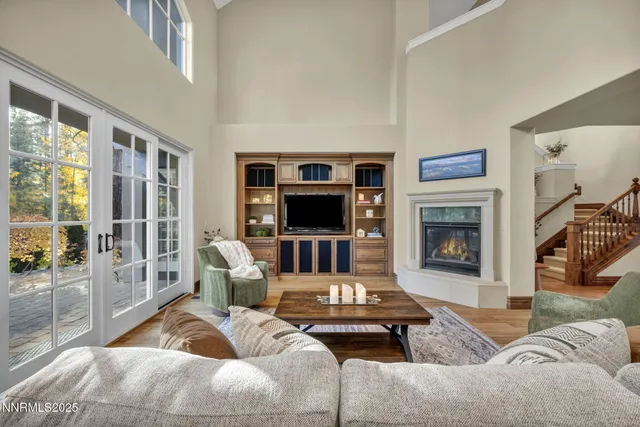 a view of kitchen with furniture and windows