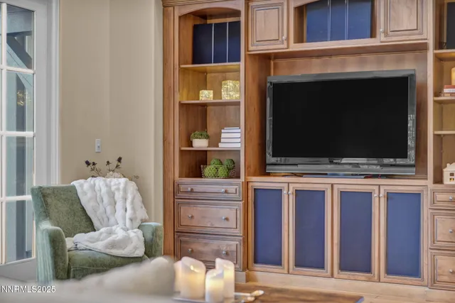 a bathroom with a granite countertop toilet a sink and a bathtub