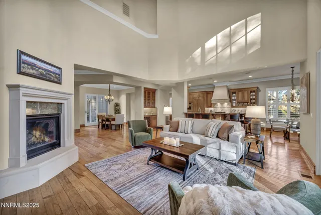 a bathroom with a granite countertop sink and a window