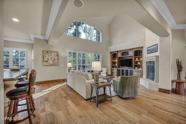 a view of a patio with table and chairs