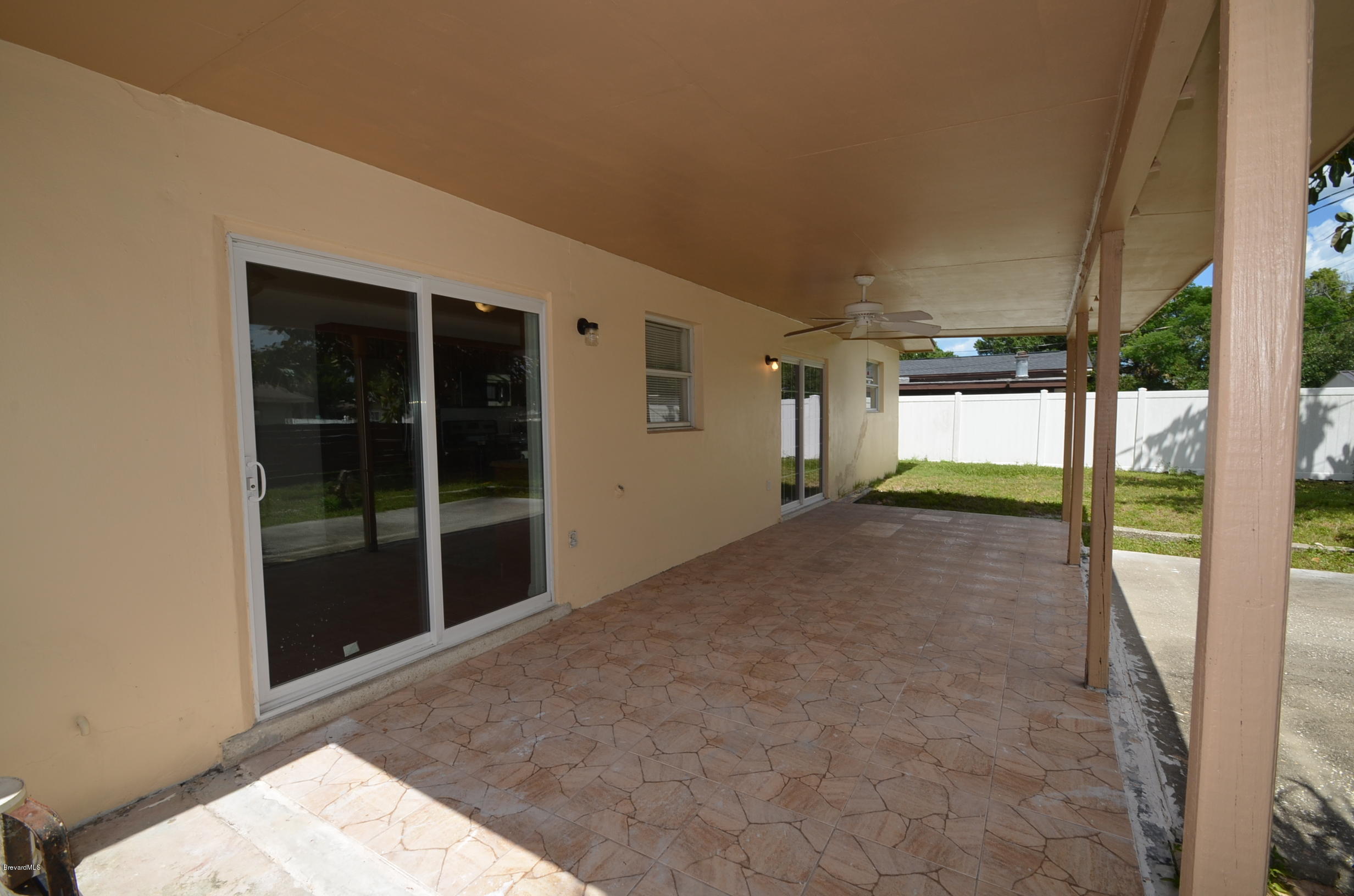 2631 Sarno Road Melbourne, FL 32935 - Photo 14 of 15 CoveredPorch