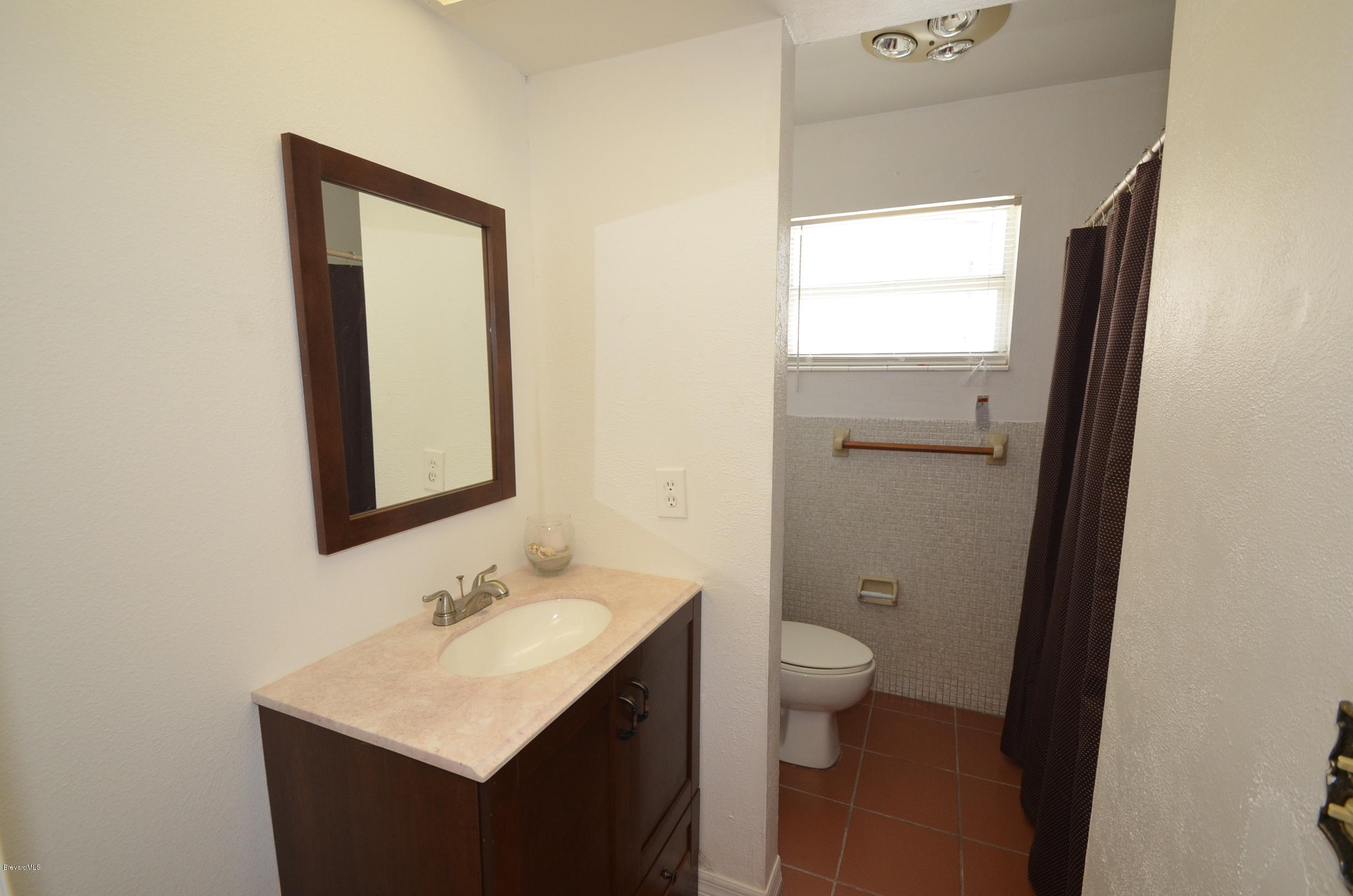 2631 Sarno Road Melbourne, FL 32935 - Photo 9 of 15 Hall Bath