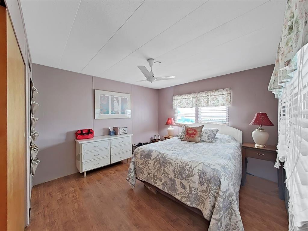 9900 Ulmerton Road, Unit 238 Largo, FL 33771 - Photo 15 of 22 a bedroom with a bed and window