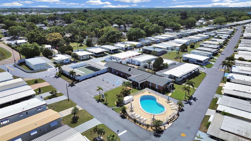 9900 Ulmerton Road, Unit 238 Largo, FL 33771 - Photo 20 of 22 an aerial view of a swimming pool patio and mountain view