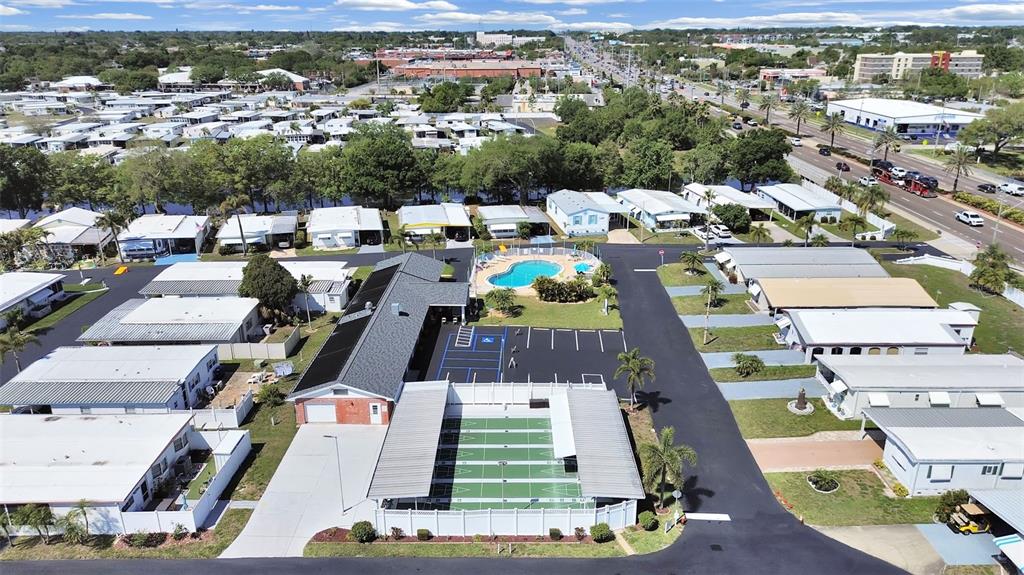 9900 Ulmerton Road, Unit 238 Largo, FL 33771 - Photo 21 of 22 an aerial view of a city with lots of residential buildings