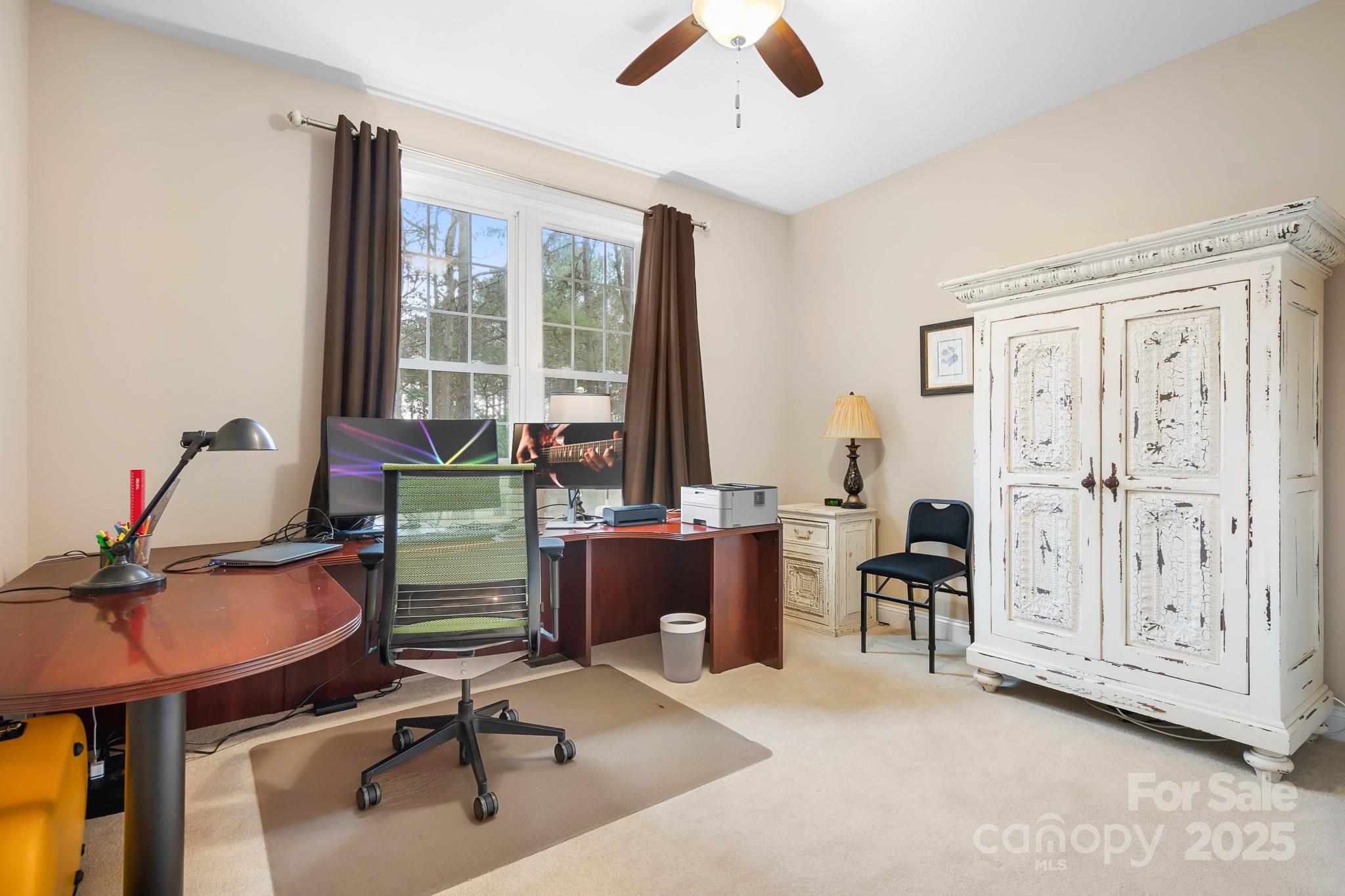 302 McCrary Road Mooresville, NC 28117 - Photo 16 of 34 a view of a workspace with furniture and a window