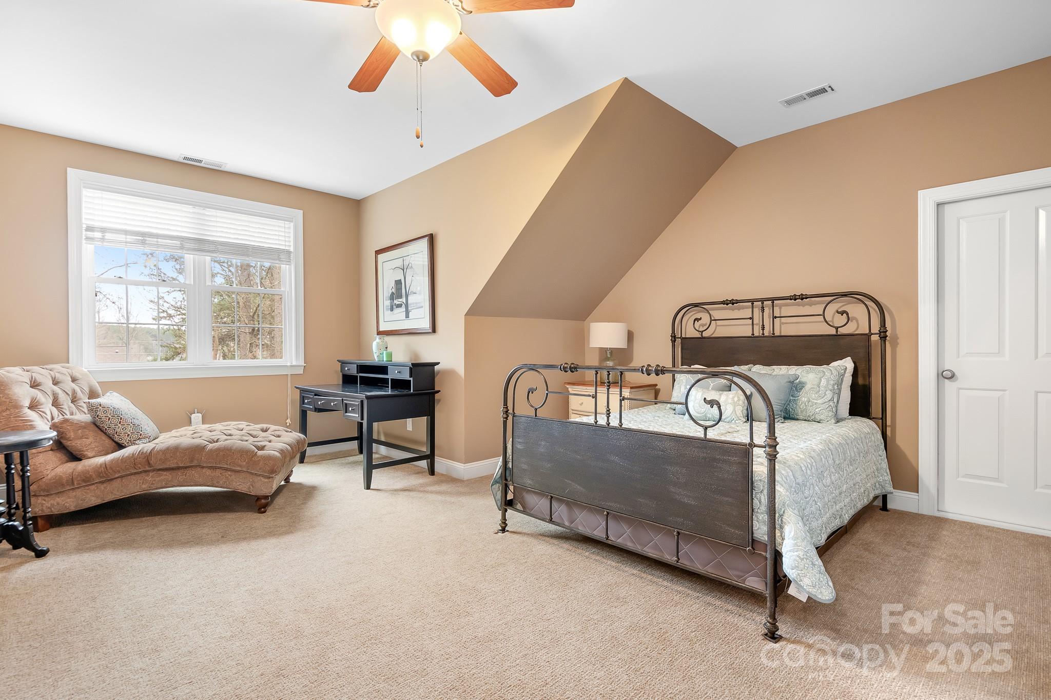 302 McCrary Road Mooresville, NC 28117 - Photo 19 of 34 a bedroom with furniture and a window