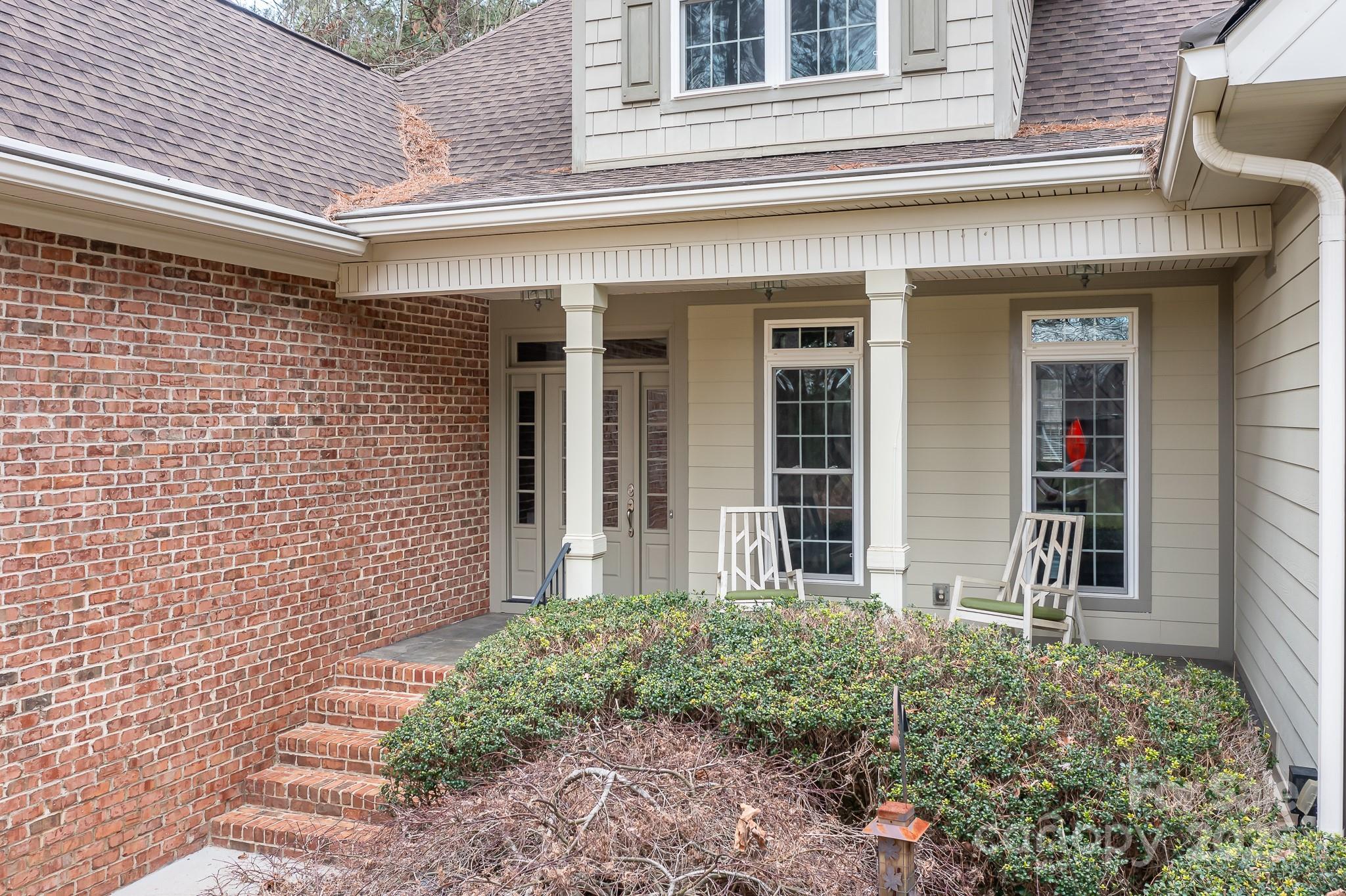 302 McCrary Road Mooresville, NC 28117 - Photo 2 of 34 front view of a brick house