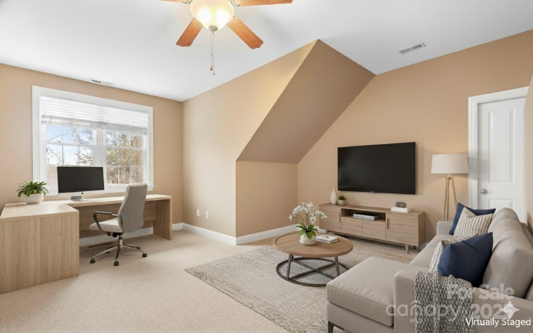 302 McCrary Road Mooresville, NC 28117 - Photo 21 of 34 a living room with furniture and a flat screen tv