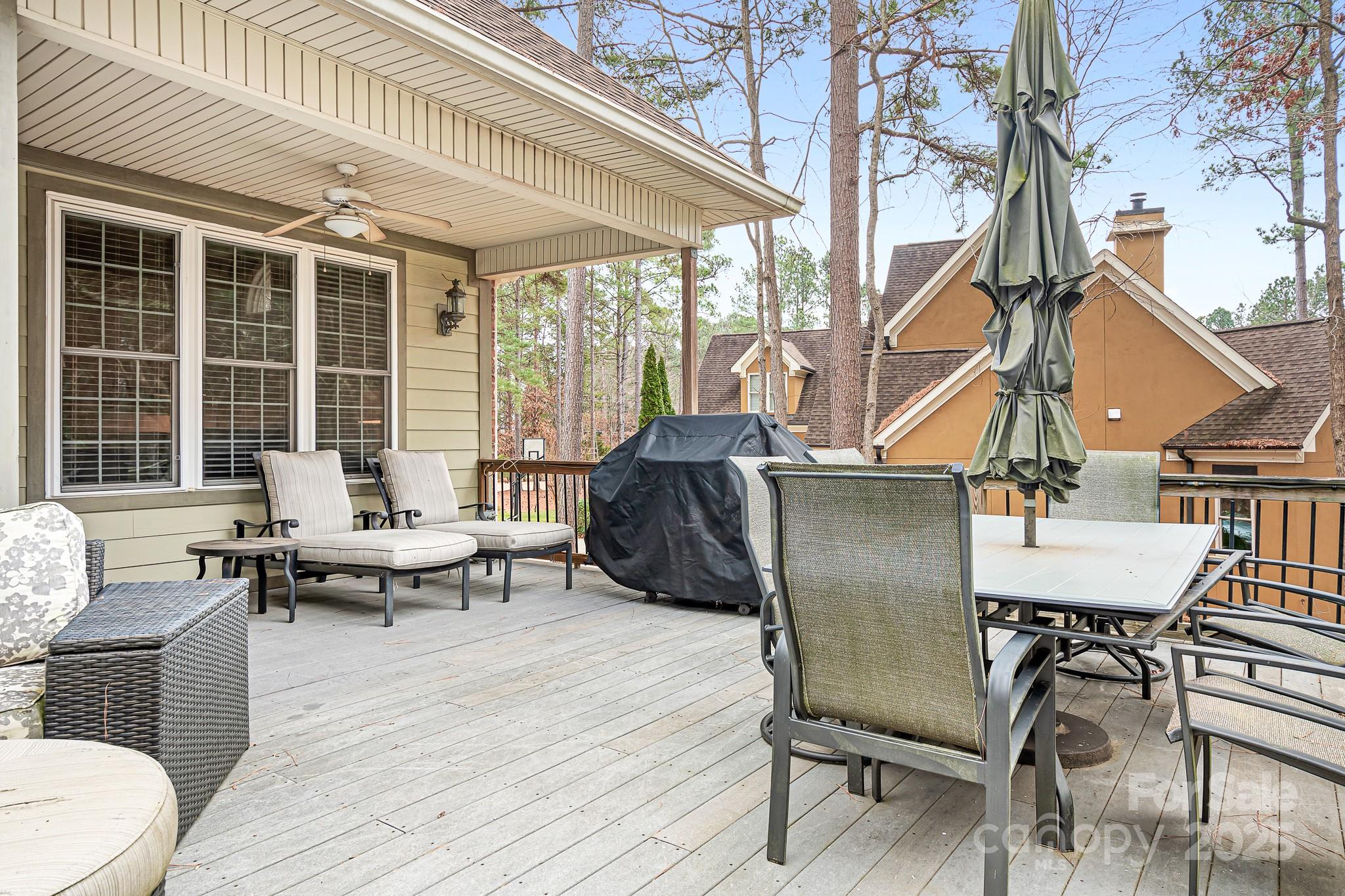 302 McCrary Road Mooresville, NC 28117 - Photo 26 of 34 a building outdoor space with patio furniture and wooden floor