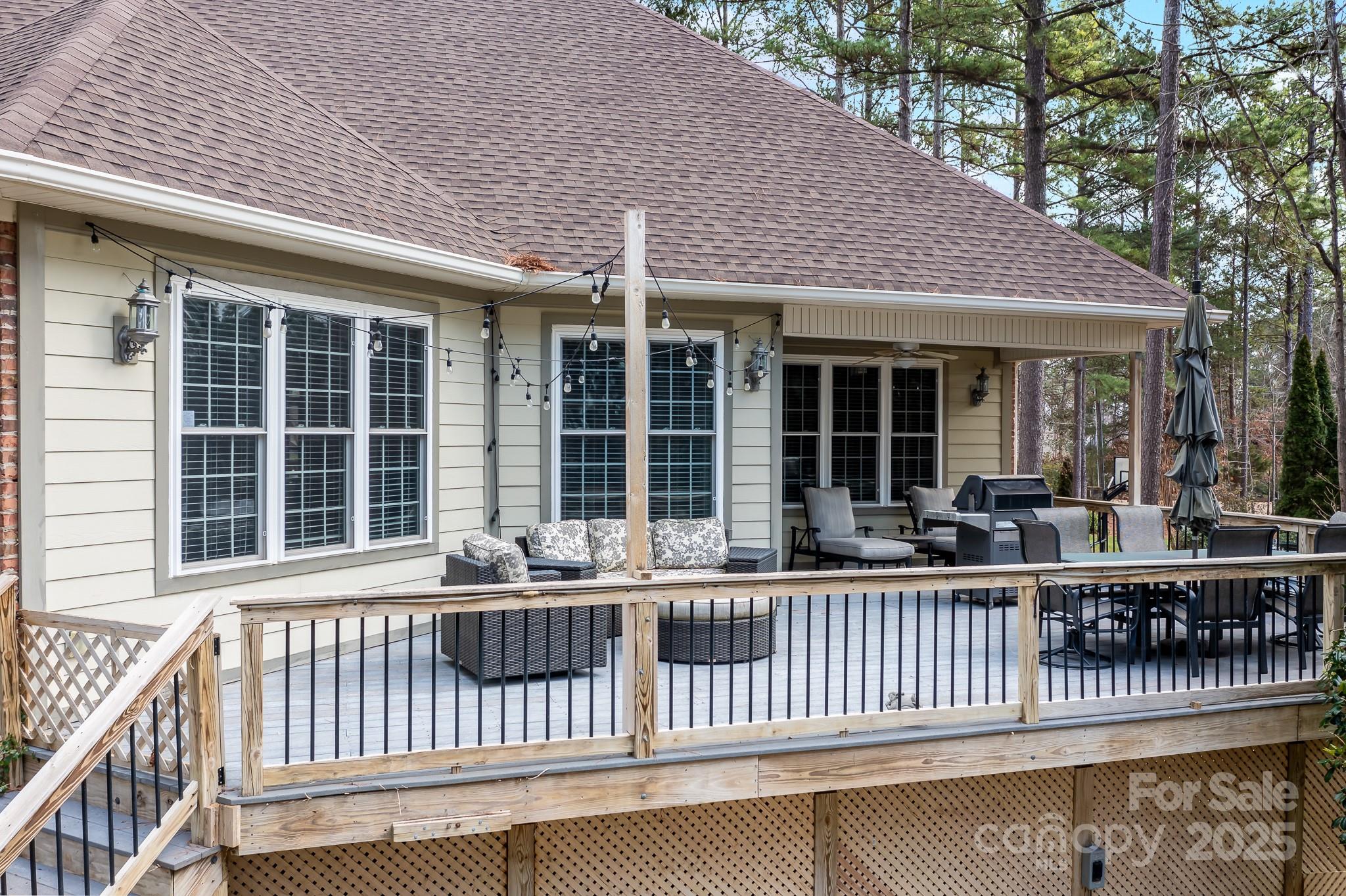 302 McCrary Road Mooresville, NC 28117 - Photo 27 of 34 a view of a house with a roof deck