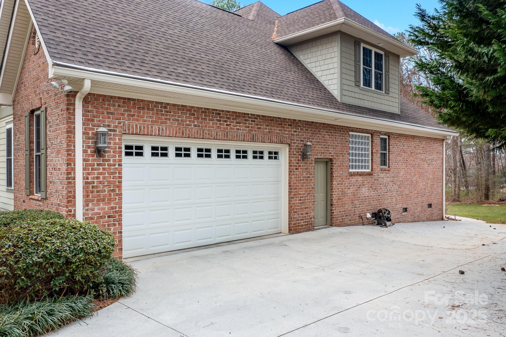 302 McCrary Road Mooresville, NC 28117 - Photo 28 of 34 a front view of a house with garage