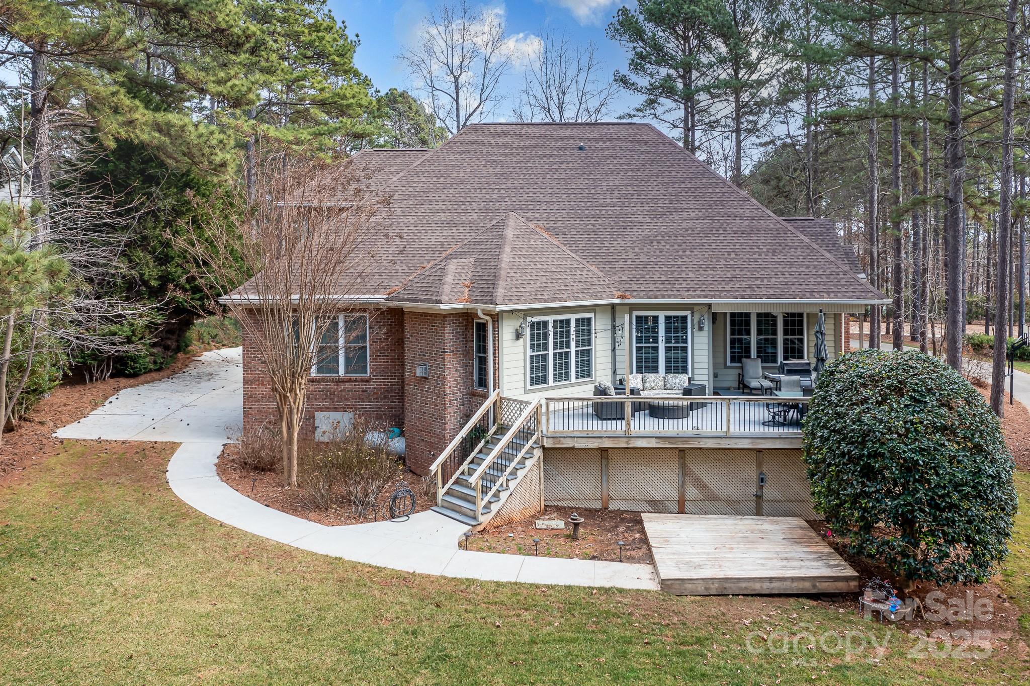 302 McCrary Road Mooresville, NC 28117 - Photo 3 of 34 a house view with sitting space and garden space