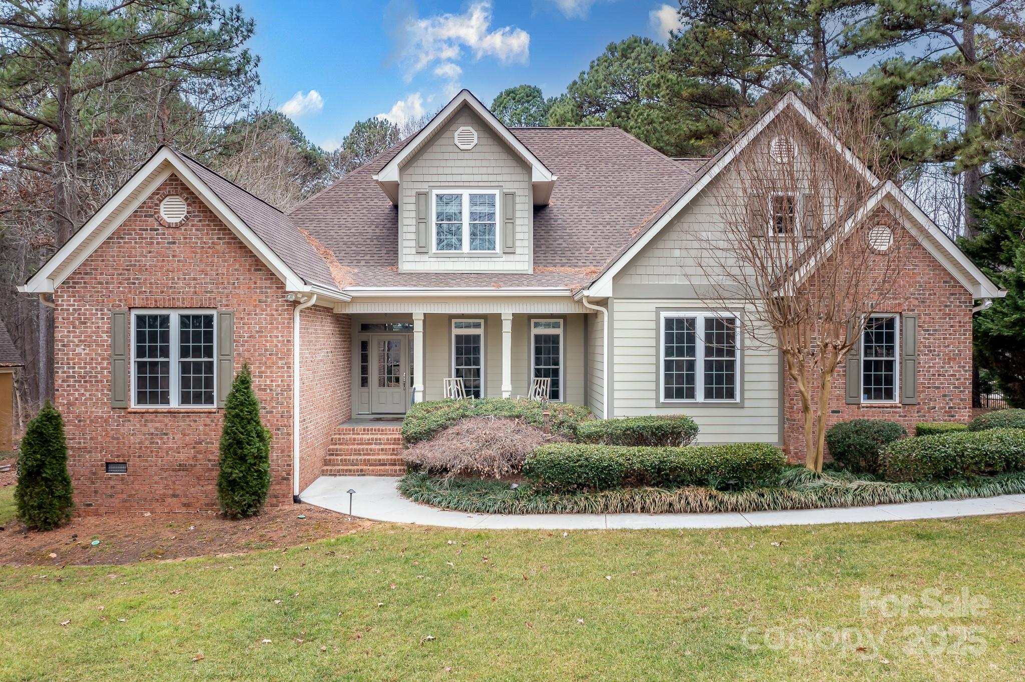 302 McCrary Road Mooresville, NC 28117 - Photo 33 of 34 a front view of a house with garden